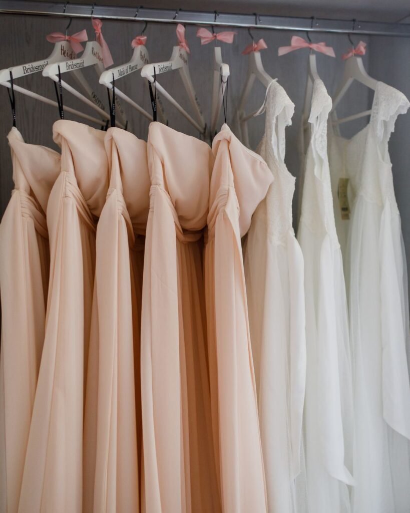 Bridesmaid and bridal dresses in soft neutrals for a neutral wedding dress code theme

