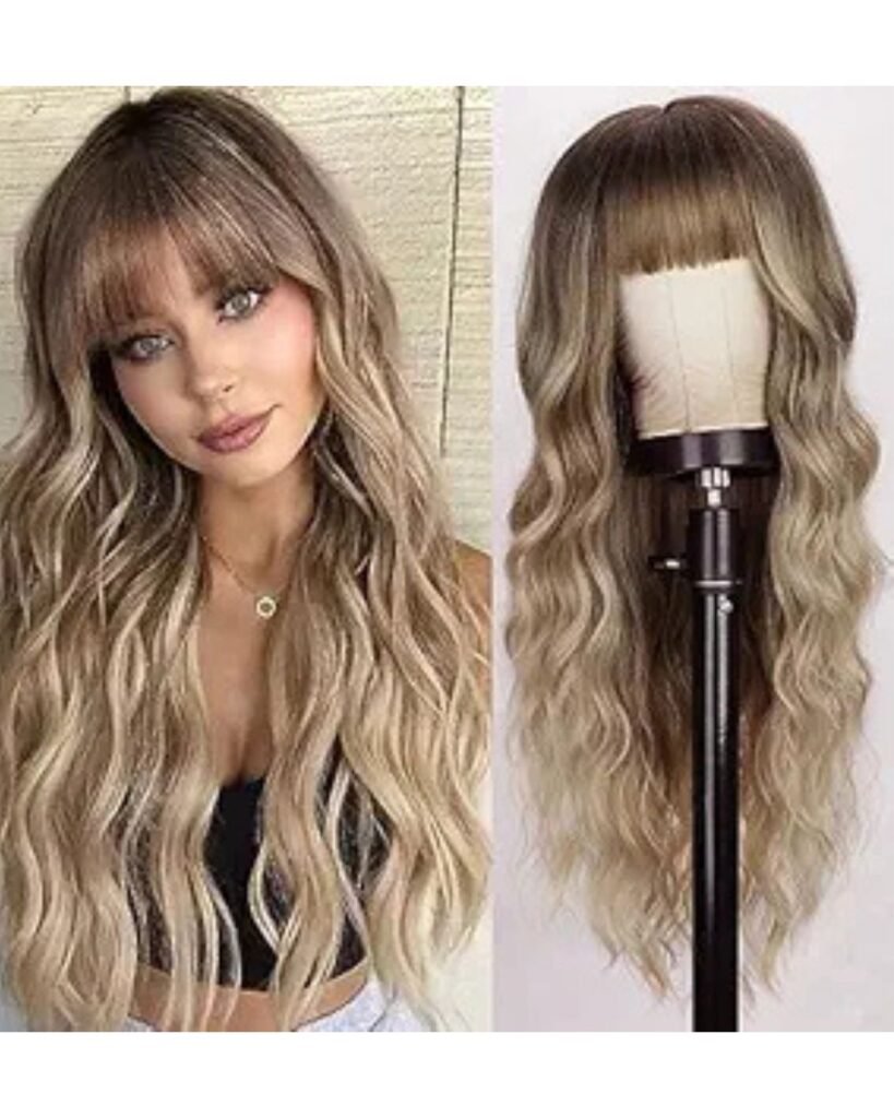 Woman wearing a long, wavy blonde wig with bangs next to a mannequin displaying the same wig style—perfect for vacation hair extensions and effortless glam.

