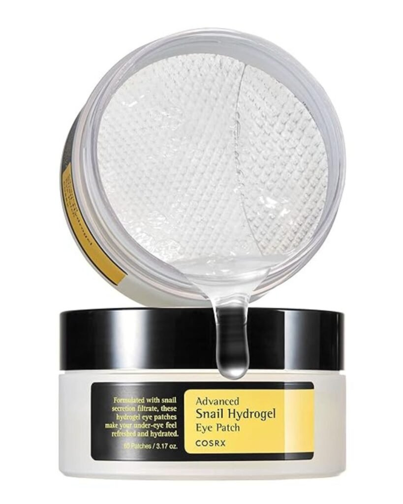 COSRX Advanced Snail Hydrogel Eye Patch open container showing clear, hydrating patches with visible essence drip