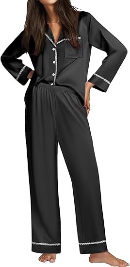 Black silky pajama set with long sleeve top and matching pants for women