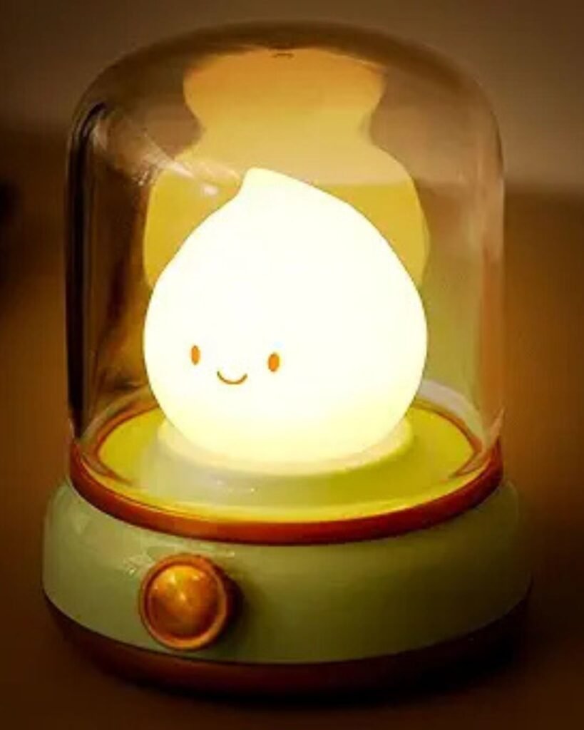 Self-Care Sunday mood lamp featuring a smiling bulb-shaped light under a vintage-style glass dome