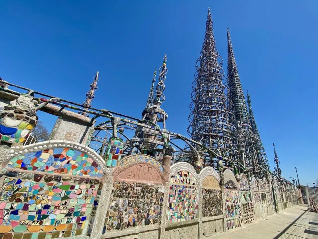 Mosaic-decorated Watts Towers in Los Angeles under a clear blue sky