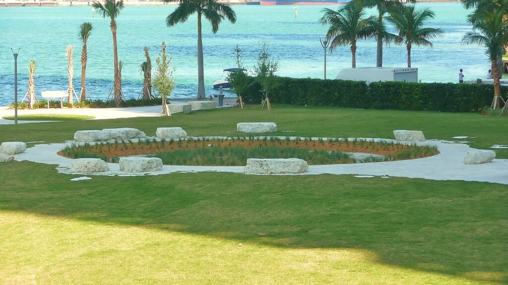 Miami Circle archaeological site in Brickell, Miami, with Biscayne Bay in the background.