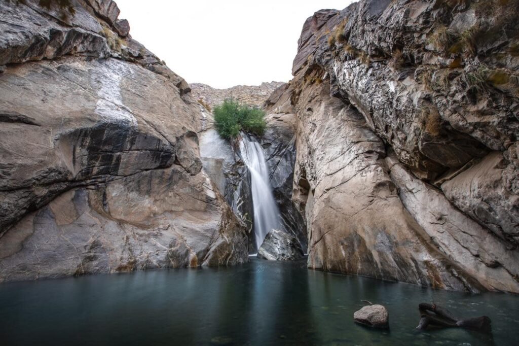 Tahquitz Falls Palm Springs waterfall flowing between desert canyon walls.