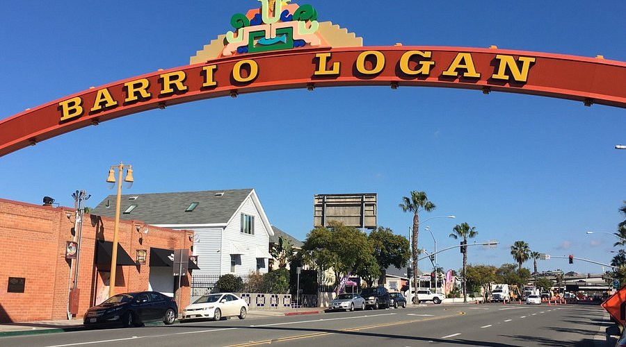 The colorful Barrio Logan sign over Logan Avenue, known for its Mexican food and local art.
