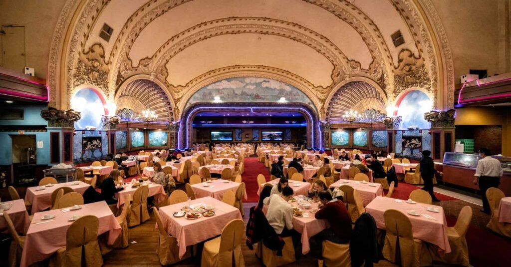 Interior of Empire Garden Restaurant Boston with grand theater-style ceiling and dim sum tables.
