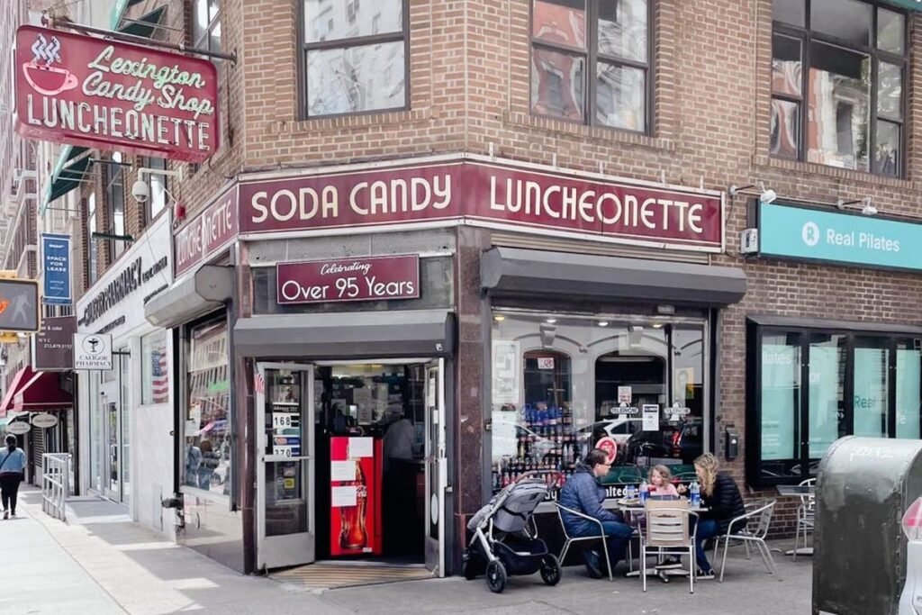 Lexington Candy Shop New York celebrating over 95 years with outdoor seating on the corner