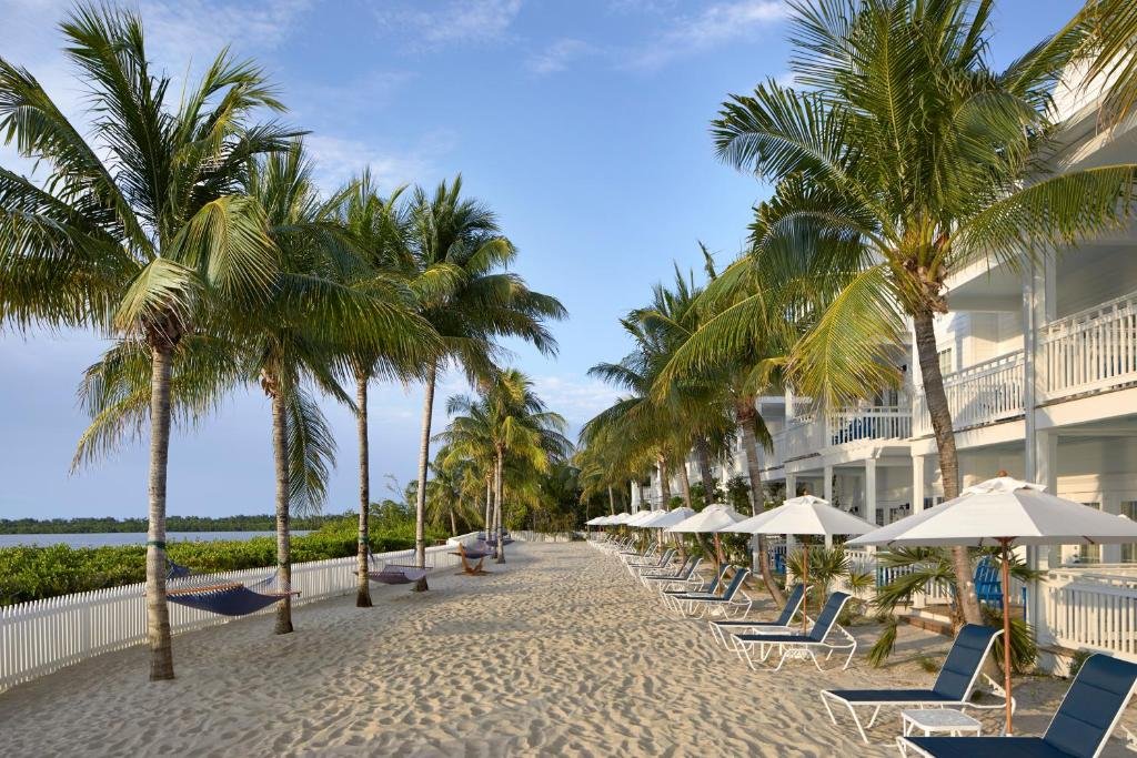 Poolside lounge area at Parrot Key Hotel & Villas, an eco-friendly resort in Key West, Florida.