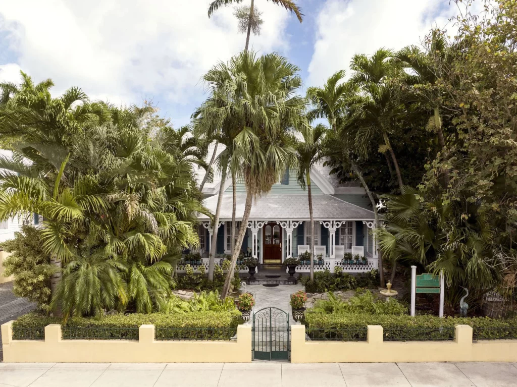 Tropical garden exterior of The Gardens Hotel, a boutique eco-friendly resort in Key West, Florida.