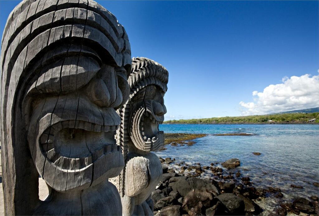 two ancient wooden tiki sculptures of pu uhonua o honaunau national park hawaii