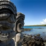 two ancient wooden tiki sculptures of pu uhonua o honaunau national park hawaii