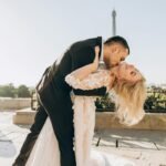 groom kissing bride neck