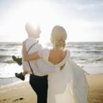 man lifting woman