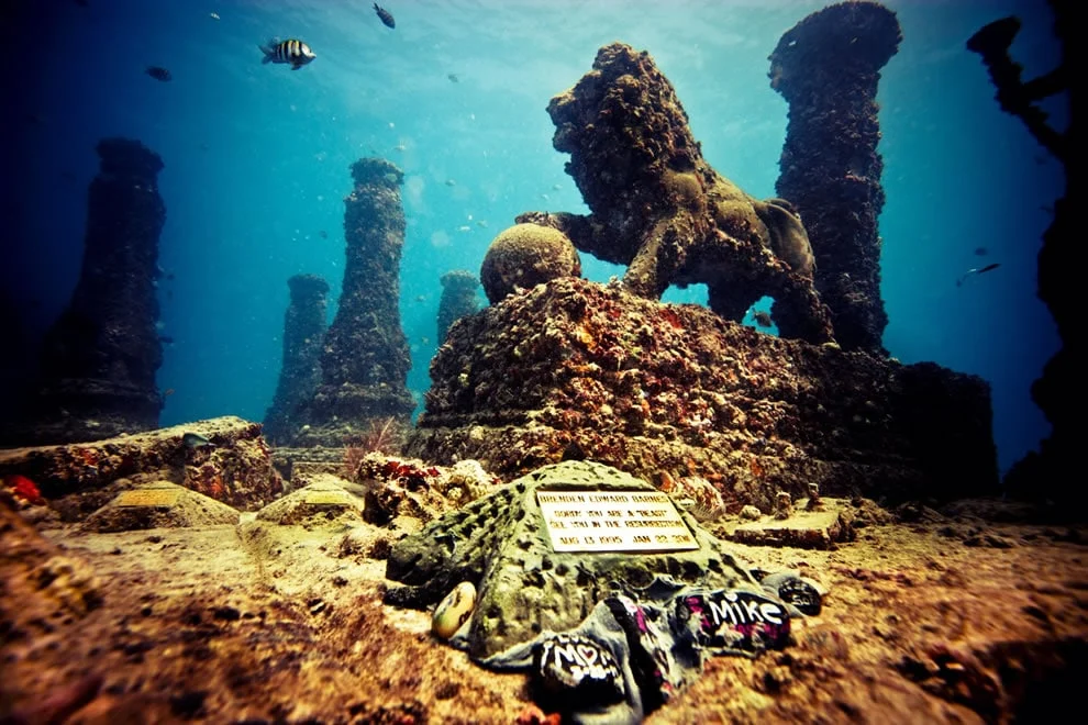 Lion statue and memorial plaque at Neptune Memorial Reef in Key Biscayne, Florida