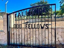 Wrought-iron gate reading ‘Fallbrook Odd Fellows’ at the historic cemetery entrance