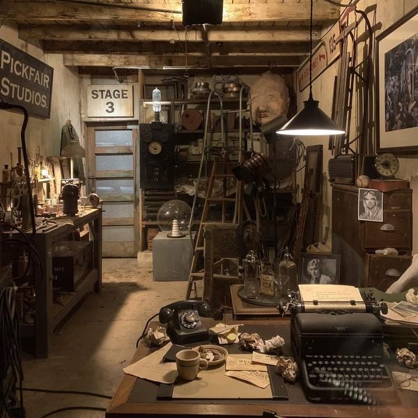 Inside the Back Lot West Hollywood garage showing vintage film props and typewriter