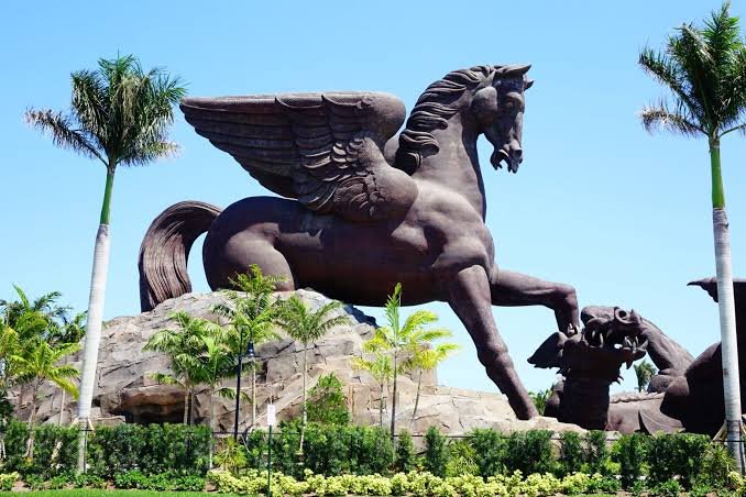 Daytime view of the Pegasus and Dragon sculpture at Gulfstream Park, Hallandale Beach, Florida