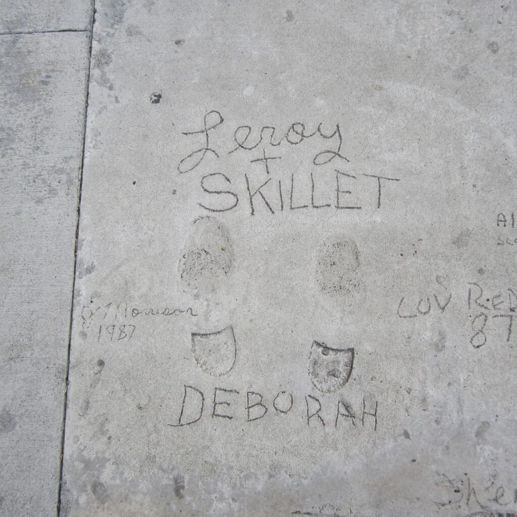 Footprints and signatures of comedy duo Leroy and Skillet in cement at the Redd Foxx Walk of Fame, West Hollywood