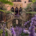 Gardner Museum Boston courtyard bursting with purple wisteria and marble statues