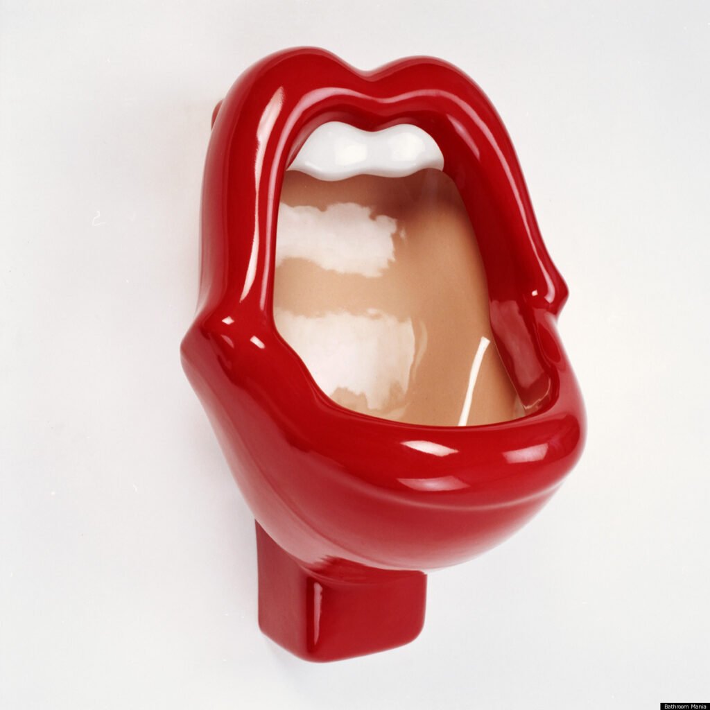 Close-up of the iconic red lip-shaped Mick Jagger urinal in San Diego