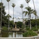 Fountain surrounded by palm trees at Beverly Gardens Park
