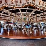 Historic Looff Carousel San Diego with hand-carved horses and giraffe at Balboa Park