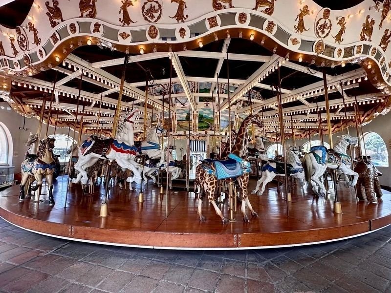 Historic Looff Carousel San Diego with hand-carved horses and giraffe at Balboa Park