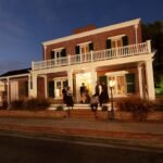 Whaley House San Diego at night with costumed actors during a ghost tour in Old Town.