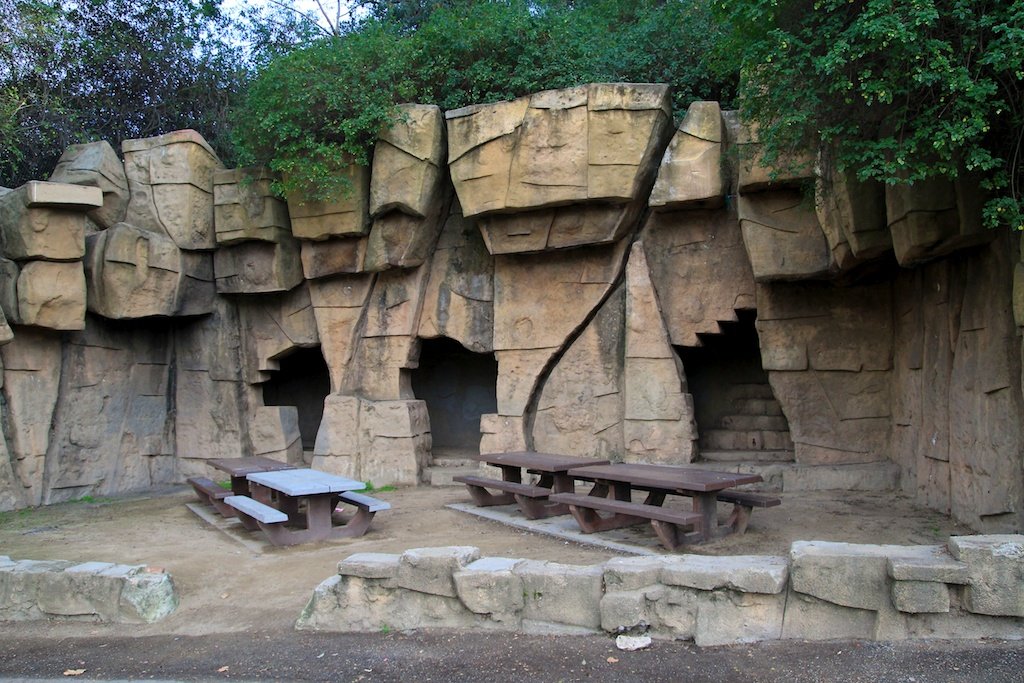 Old Zoo Los Angeles picnic area with stone enclosures and picnic tables in Griffith Park