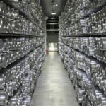 Rows of preserved ice cores stored in metal tubes at the National Ice Core Lab in Denver, Colorado.