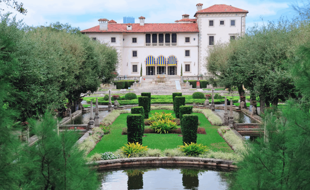 The gardens of Vizcaya Museum Miami featuring manicured hedges, fountains, and historic villa