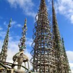 Tall spires of the Watts Towers in Los Angeles reaching into the sky