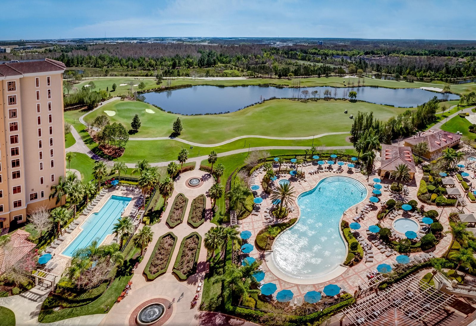 Aerial view of Rosen Shingle Creek’s pools and golf course, an eco-friendly resort in Orlando, Florida.