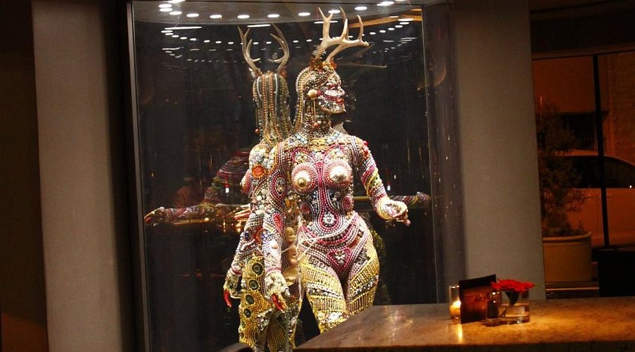 Unique art display inside Hanny’s Phoenix Arizona featuring jeweled mannequin sculptures